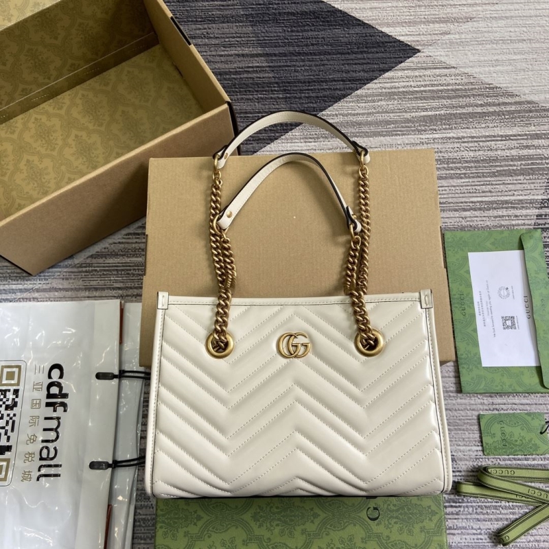 G*u*i shopping bags